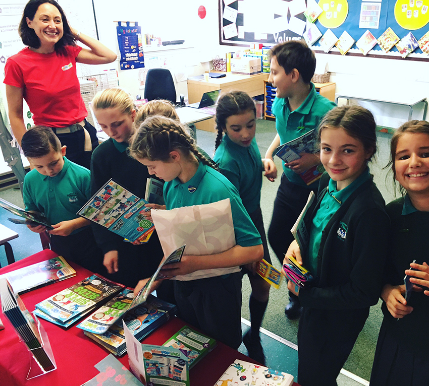 Pupils choosing science magazines