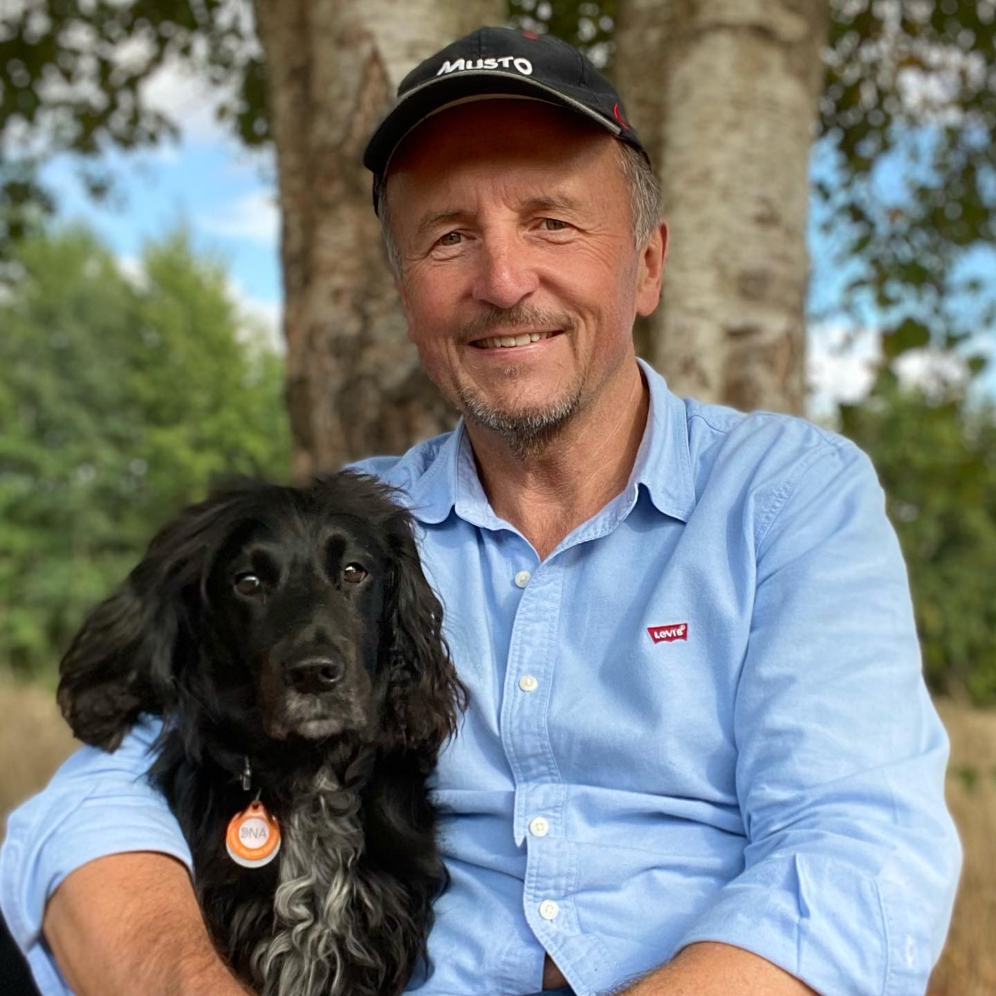 Colin Butcher, a pet detective, with his highly-trained spaniel, Molly.